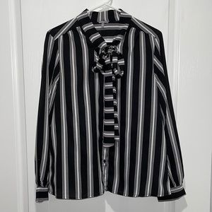 Women’s L black & white striped button up top with tie from Charlotte Russe.